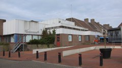 Laat gemeente verkrot postkantoor Huesmolen kopen